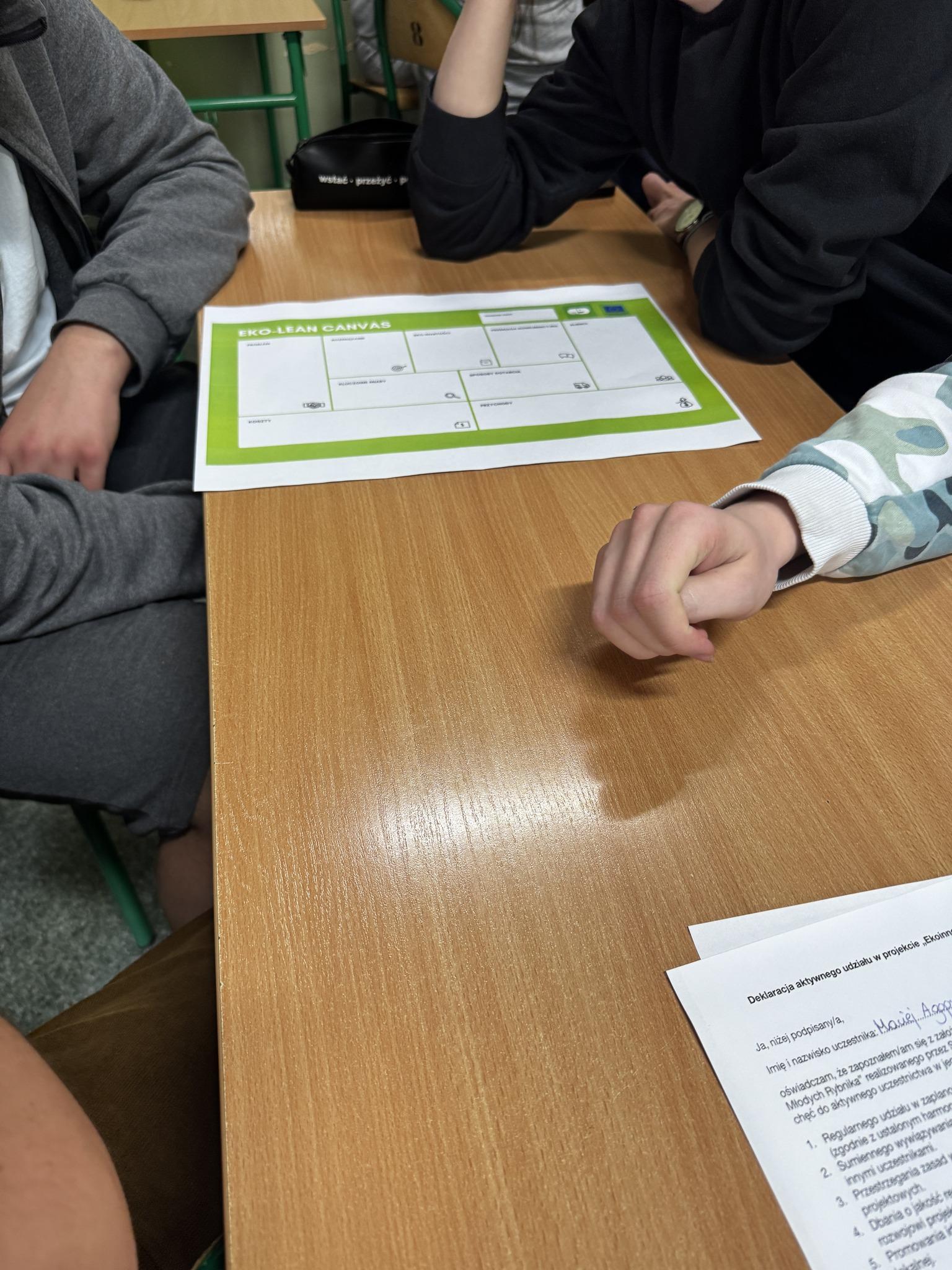 Group work by students in the classroom during the Young Eco-Innovations of Rybnik project classes.