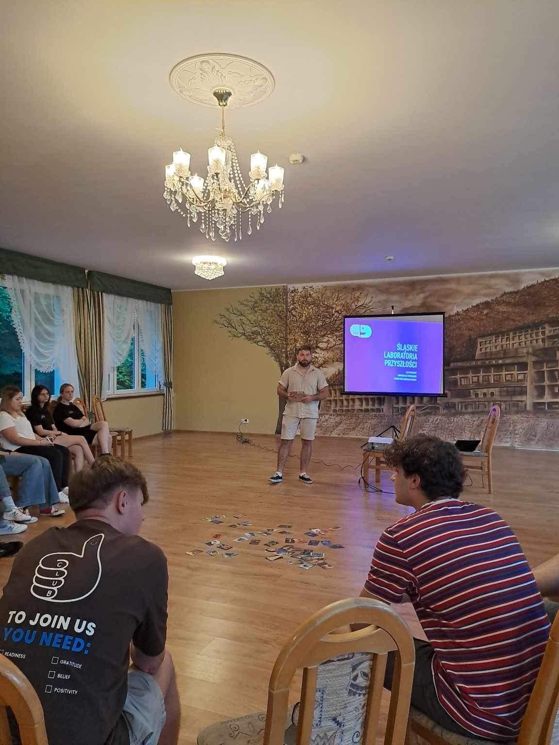 Group photo of youth project participants after workshop sessions.